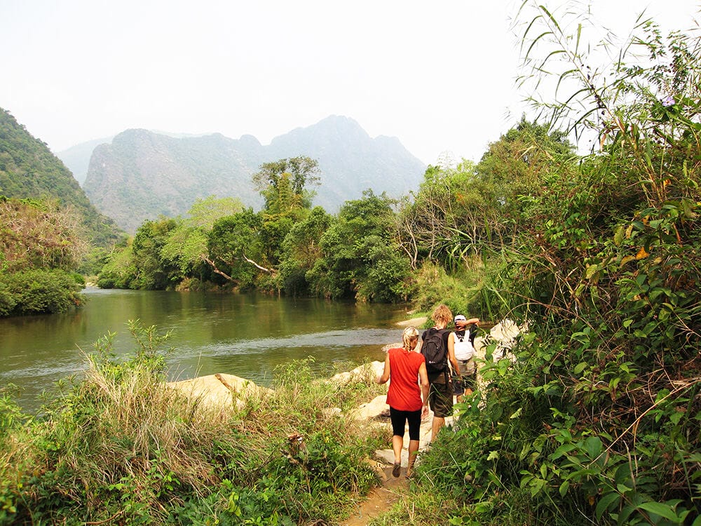 FULL DAY TREKKING AND CAVING TOUR IN VANG VIENG