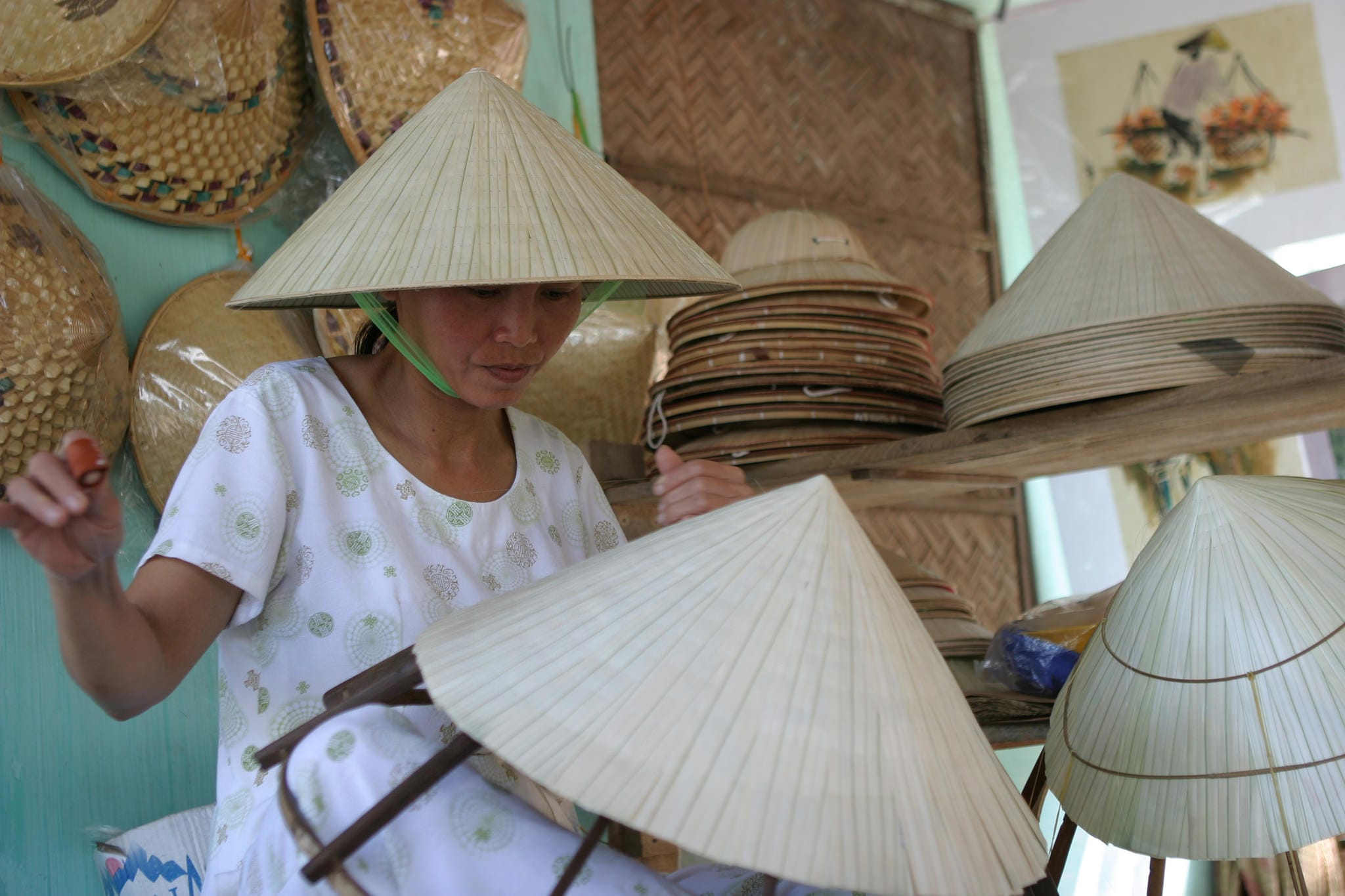 conical-hat-mekong-delta- What Are the Top Cultural Experiences on a Can Tho to Phnom Penh Cruise Trip?