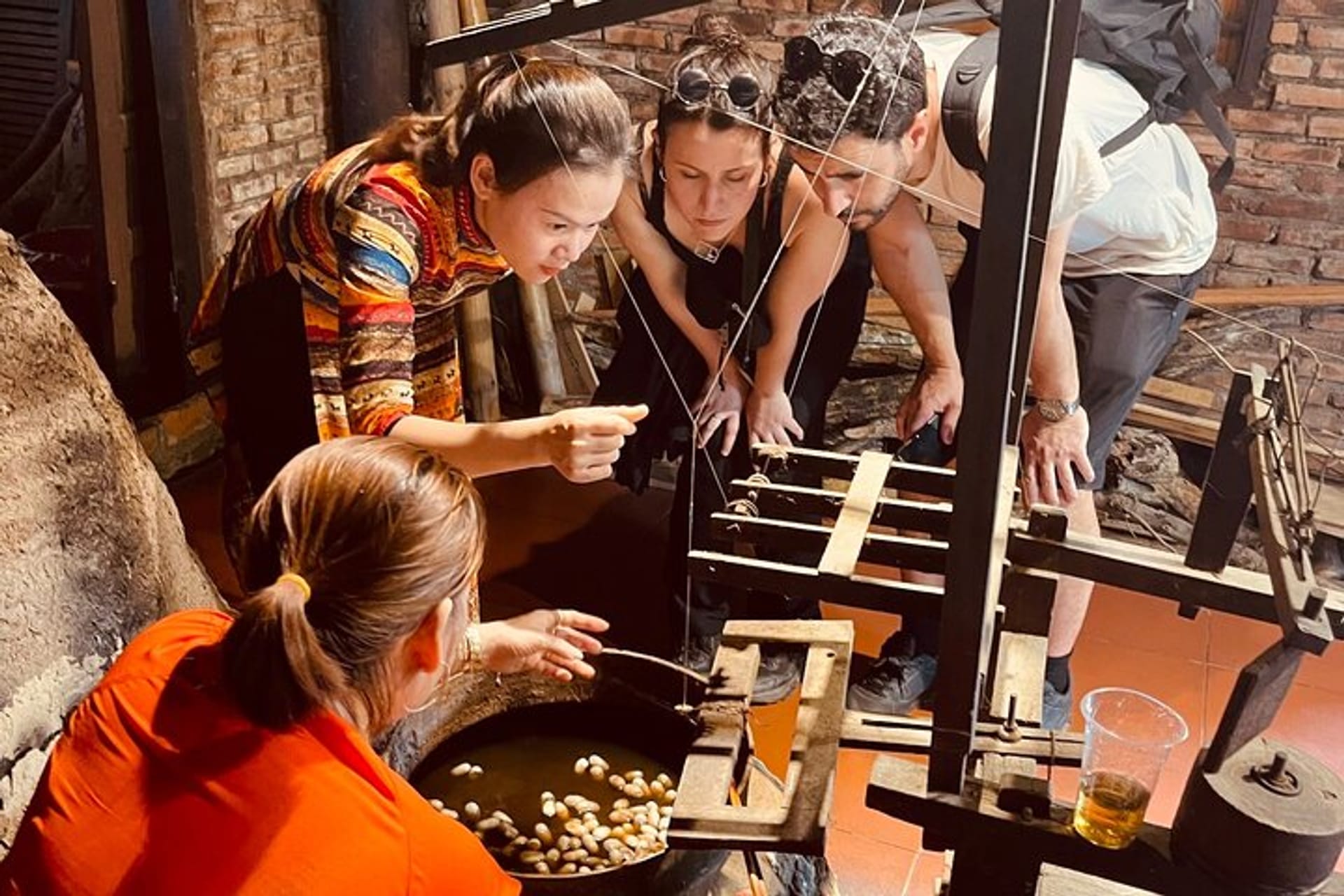 Tailoring-and-Silk-Weaving-in-hoian What Hoian's Traditional Crafts Can Tourists Learn?