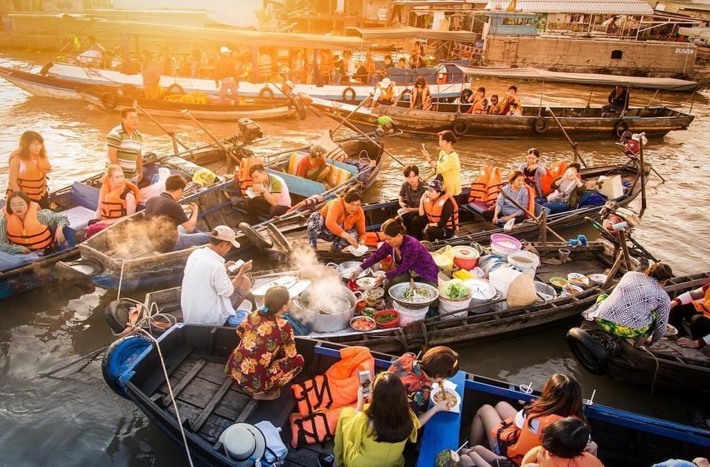 Breakfast-on-Cai-Rang-Floating-Market-Unforgetable-experience Top 8 Reasons Why Southern Vietnam Travel Should Be Your Next Travel Goal